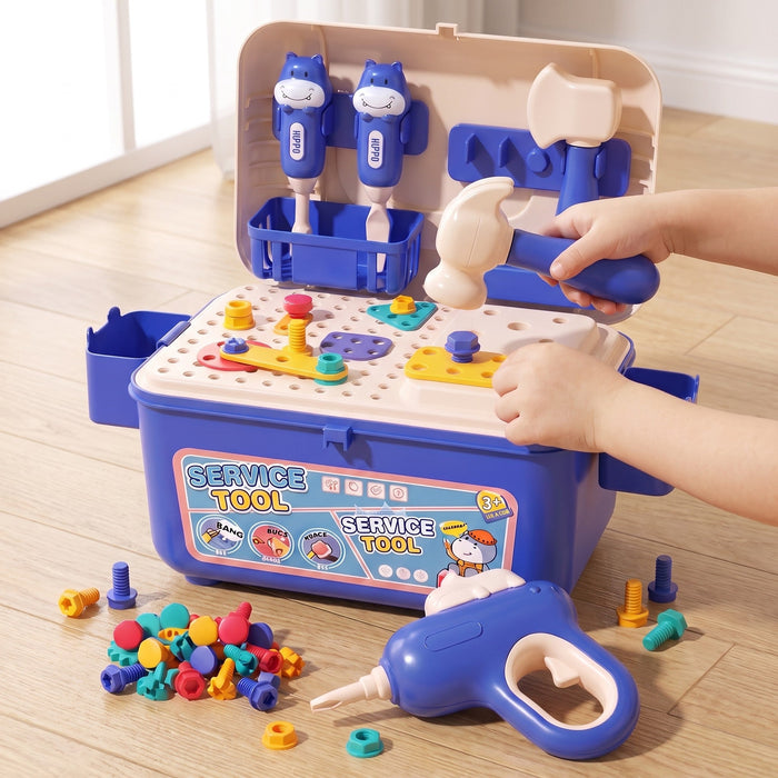 A child's hands tap the pegboard with a toy hammer, with a pile of colorful nuts and bolts and the toy drill on the floor