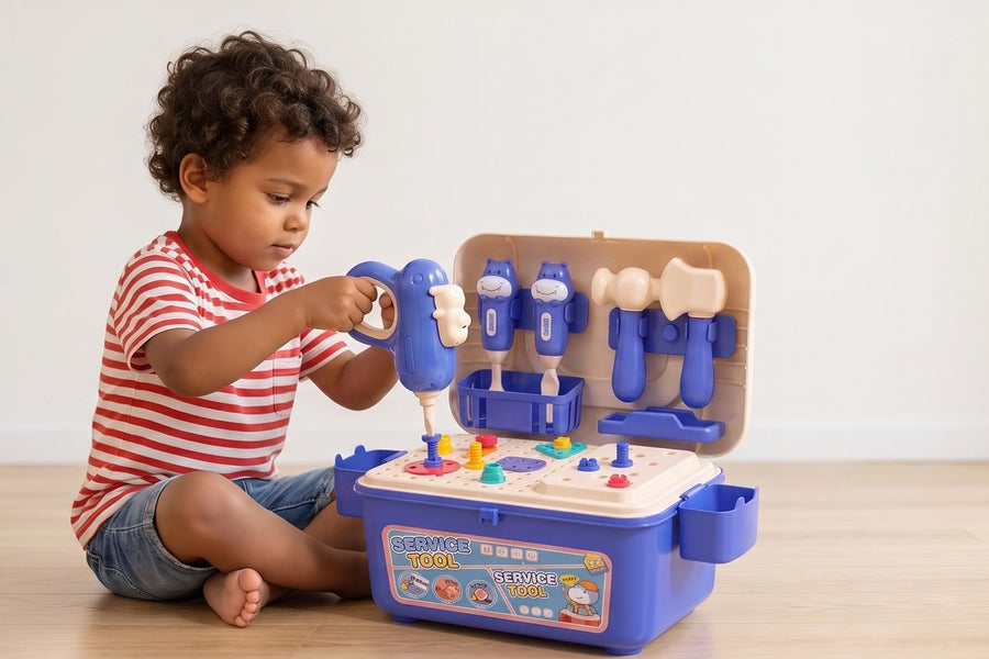 A child playing with the BuildBox tool bench