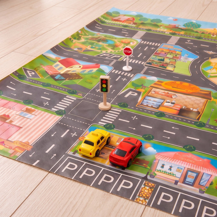 Close-up of a yellow taxi and a red car in a parking spot on the mat, near a stop sign and a traffic light