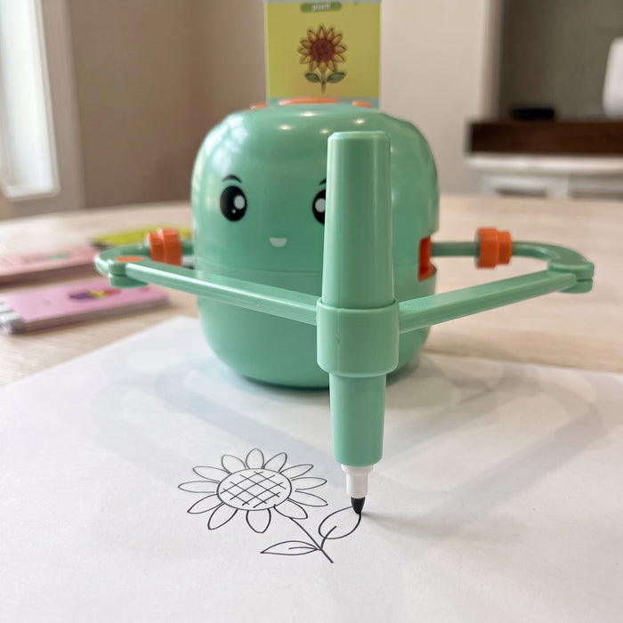 Close-up of the robot's pen arm drawing a sunflower on paper, from the sunflower card in its top