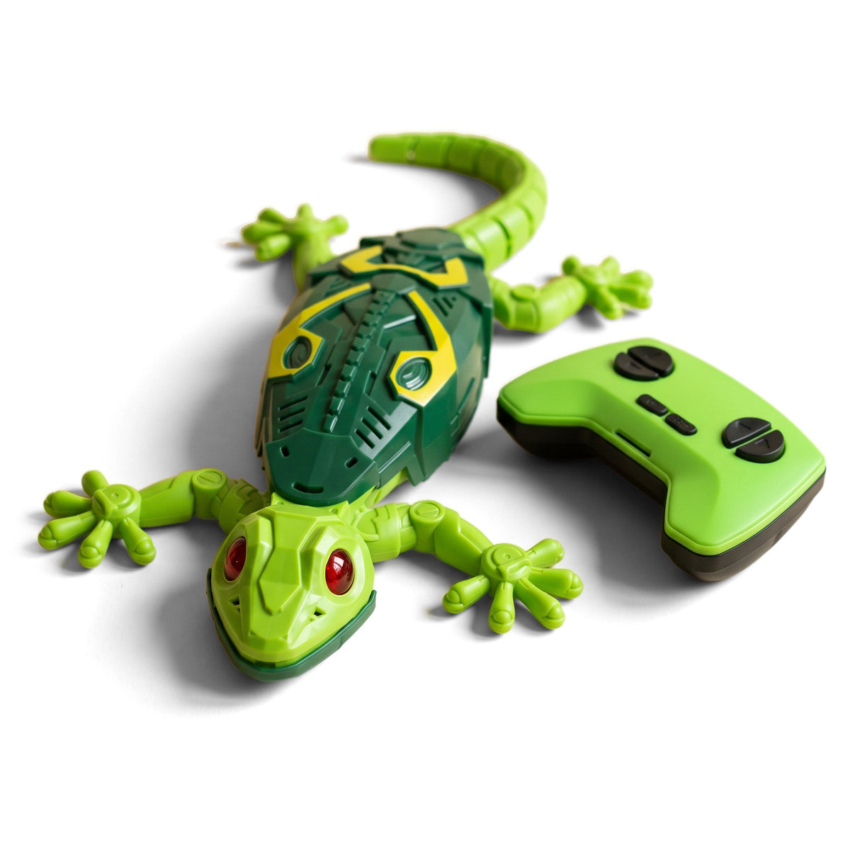Wall-Climbing Lizard: a green lizard toy with red eyes and jointed legs and tail, next to its green remote control