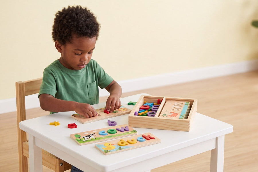A child playing with the Spell and Play