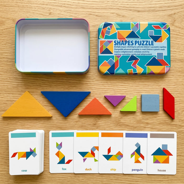 The set laid out: an open tin and its Shapes Puzzle lid, seven wooden pieces (five triangles, a square and a parallelogram) and cards for a cow, fox, duck, ship, penguin and house