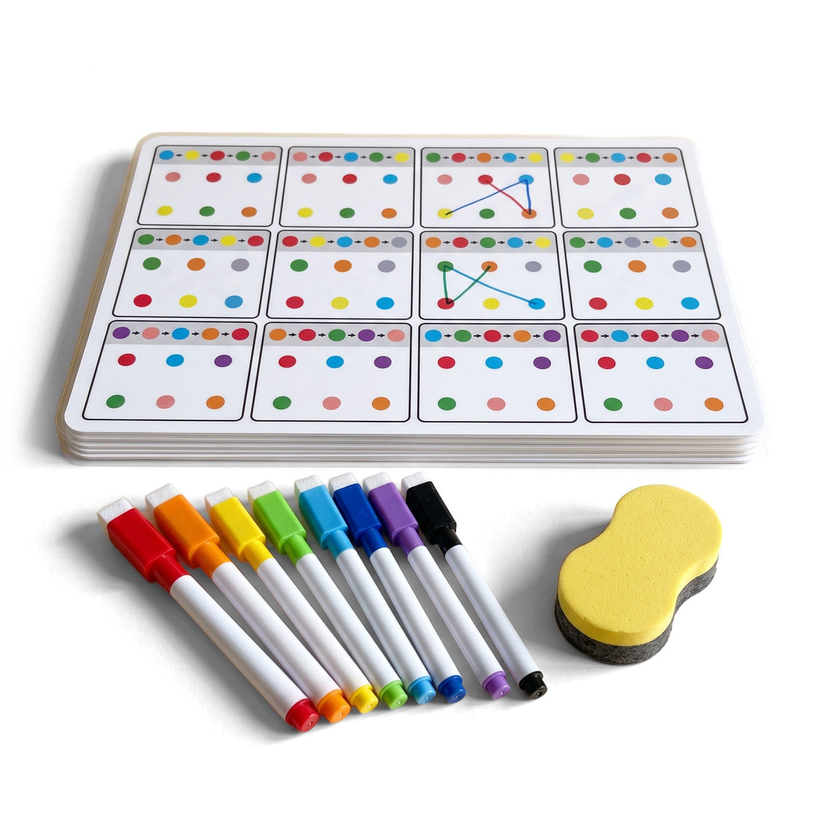 The puzzle cards with eight colored markers and a yellow eraser, two of the puzzles already joined with colored lines.